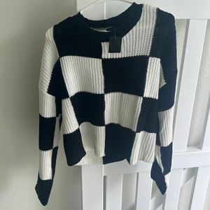 Black and white checkered fall sweater